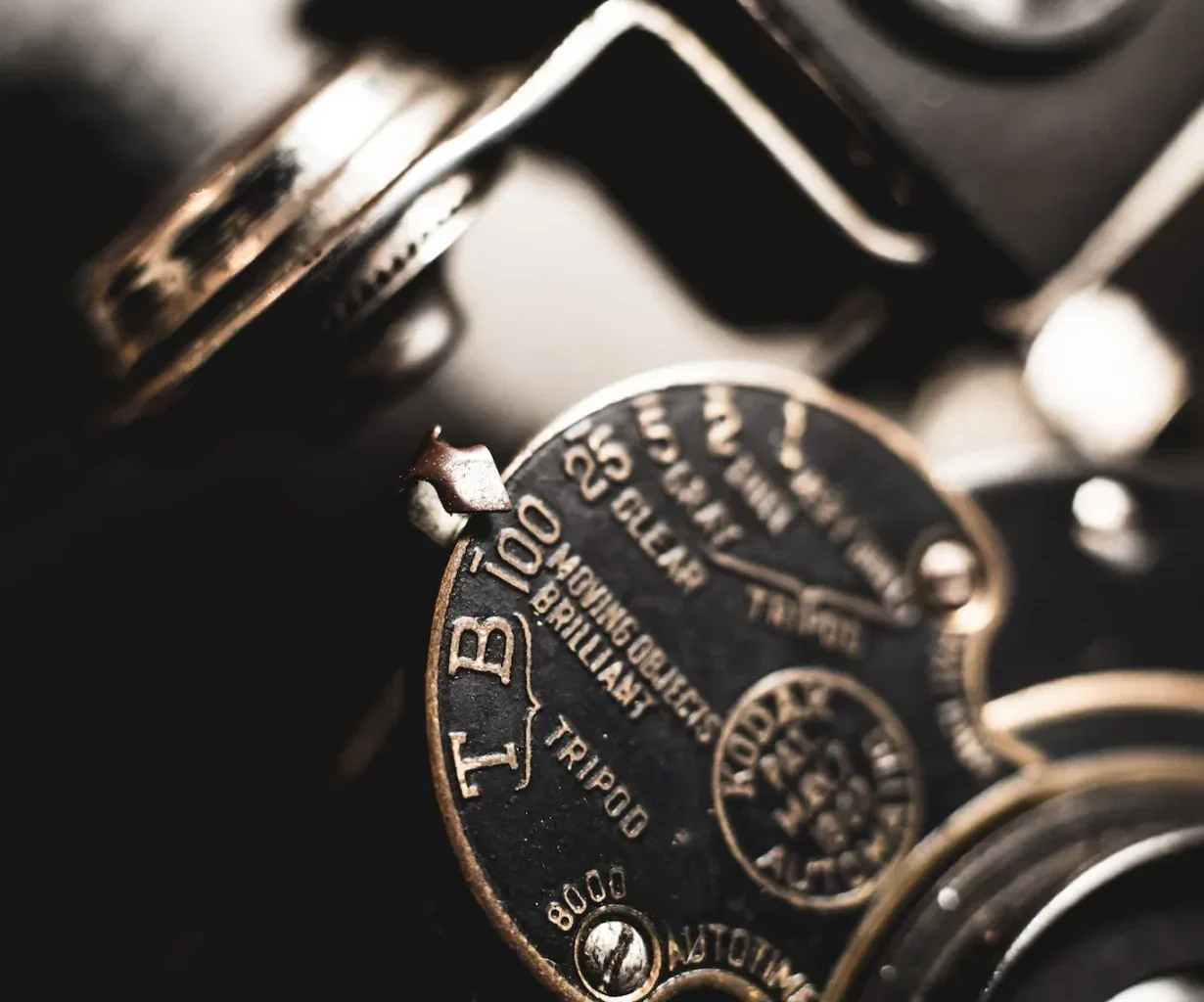 a close up of a typewriter with a clock on it